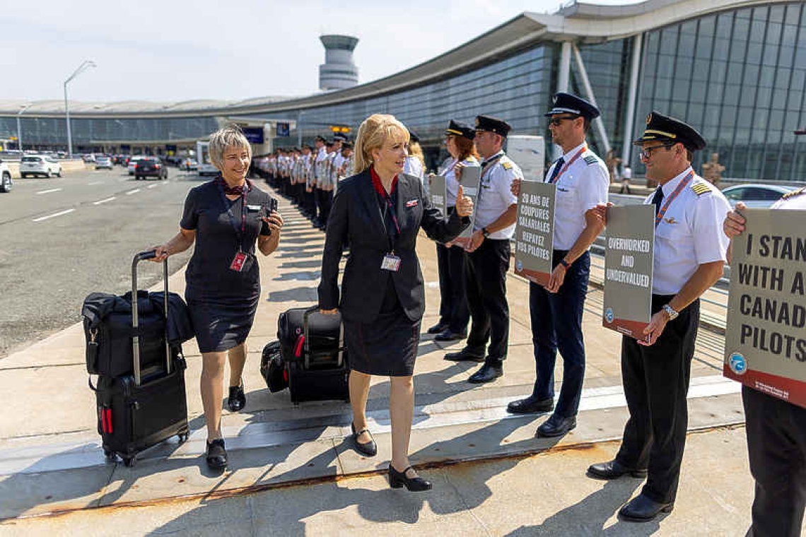 Air Canada strikes last-  minute deal with pilots